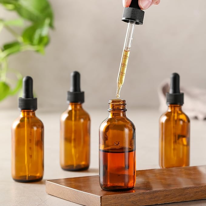 4 Pack 1 oz Glass Dropper Bottles with Measured Dropper - 30ml Dark Amber Tincture Bottles with Graduated Calibrated Glass Eye Droppers (1ml) for Essential Oils, Liquids - Leakproof Travel Bottles